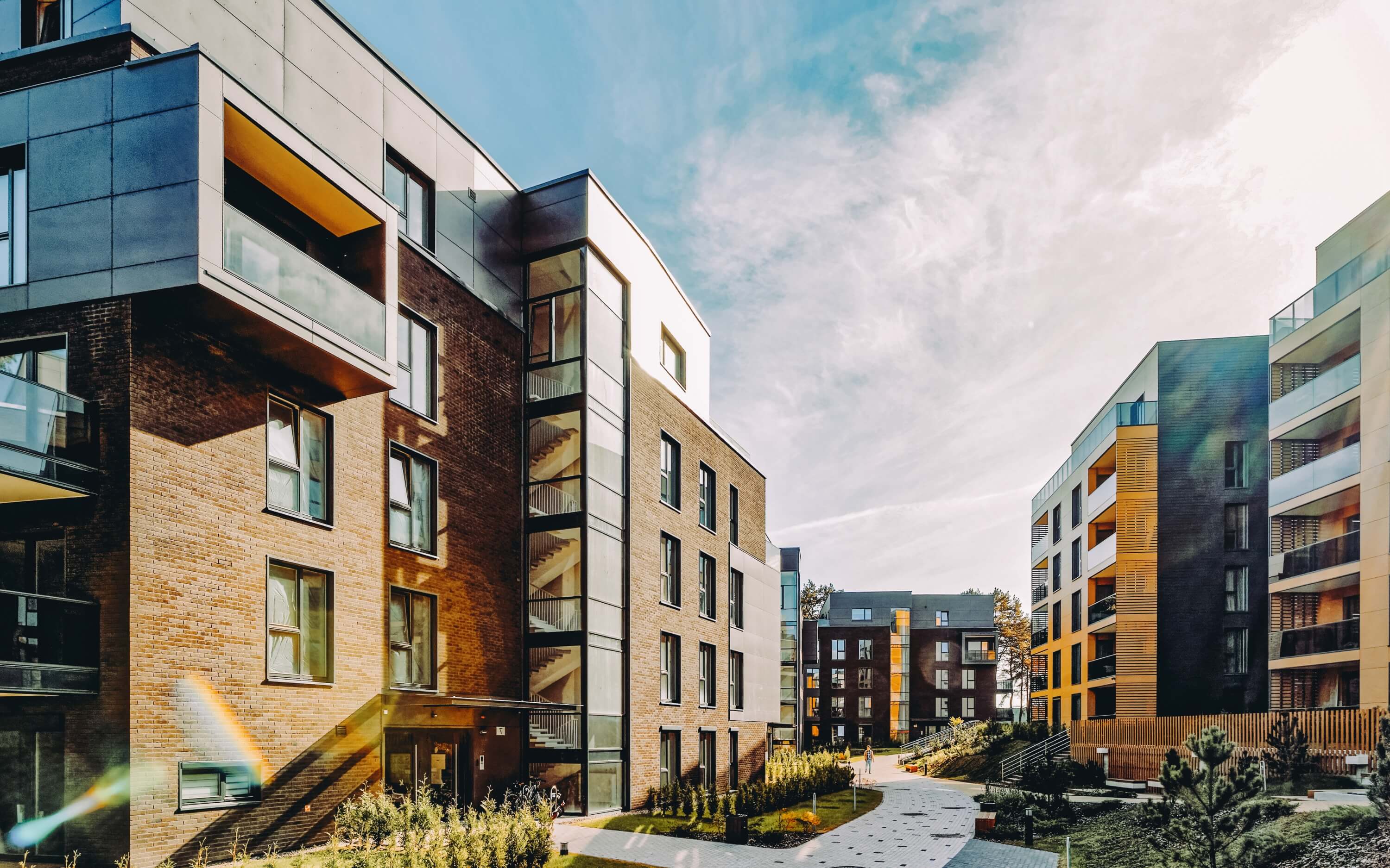 Beautiful home exterior with for-sale sign, QR code visible on sign rider, curb appeal.